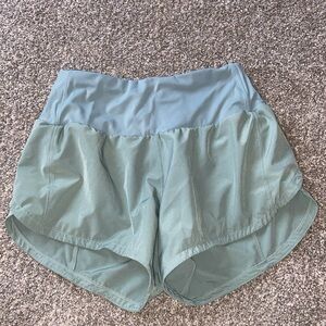 green athletic shorts barely worn
